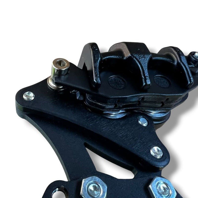 LEFT HANDBRAKE CALIPER BRACKET - Thebrapshop