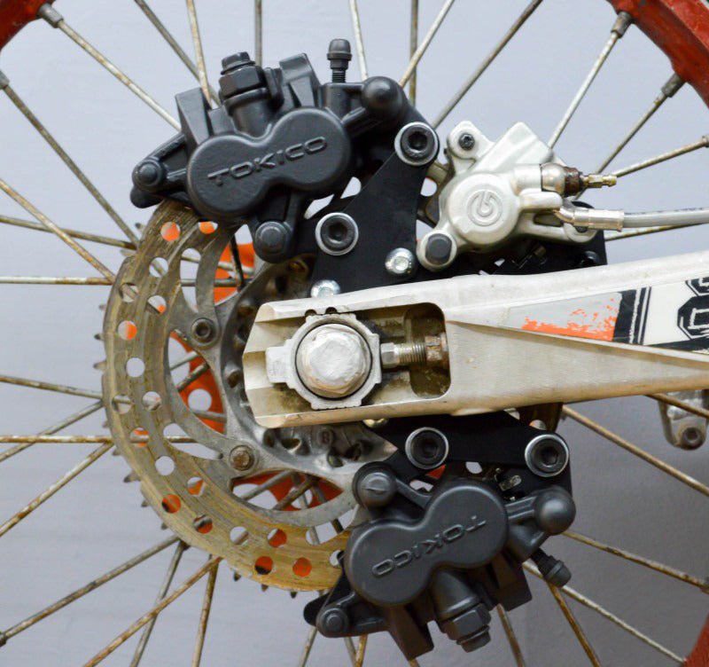 TOKICO ADAPTERS LEFT HANDBRAKE BRACKET - Thebrapshop